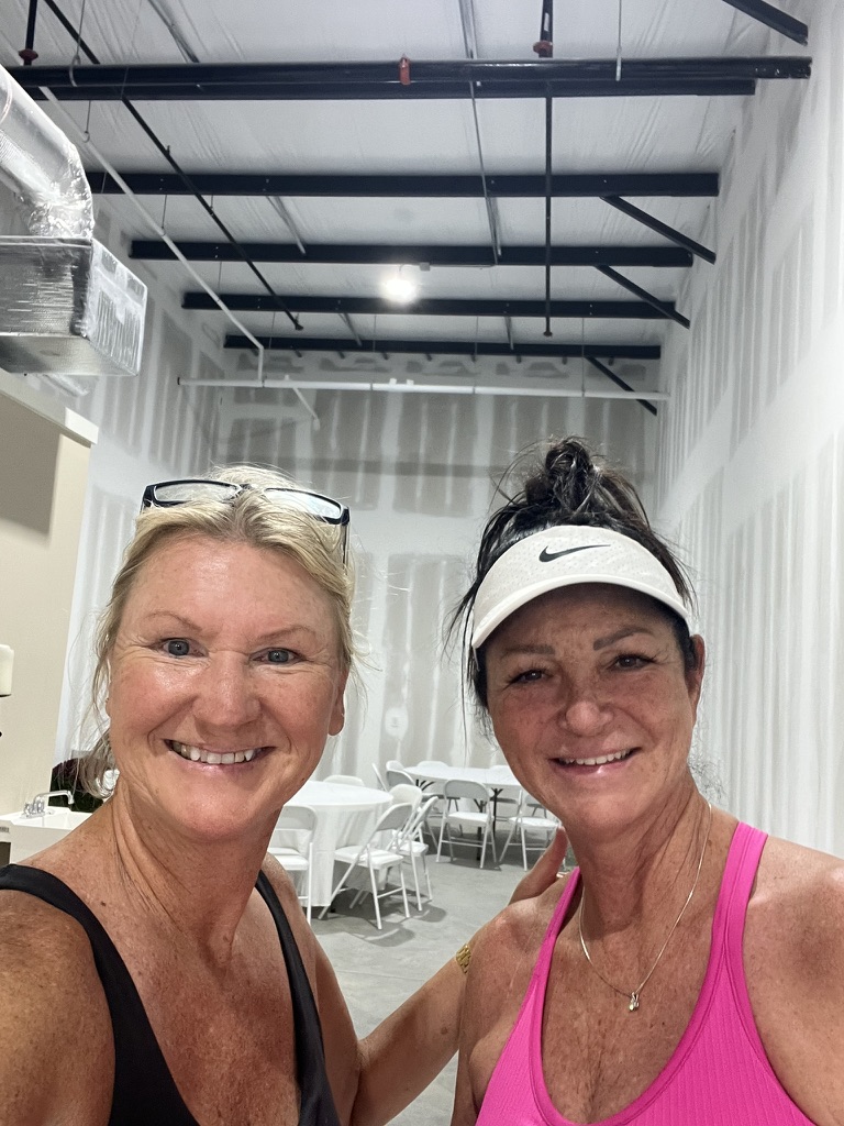 Stephanie Engelerdt and Lisa Lepkofker in the SELL Co. donation warehouse.